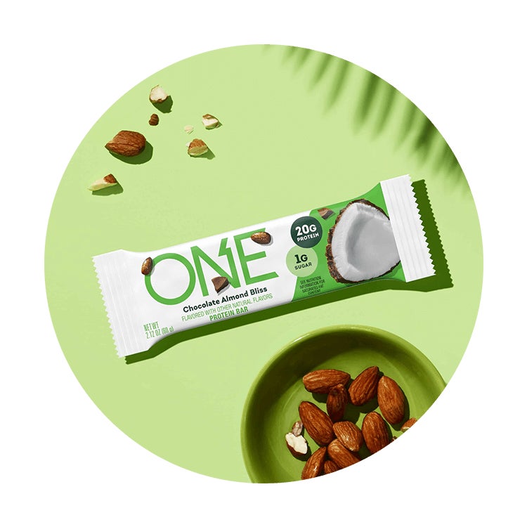 one bars chocolate almond bliss flavored protein bar surrounded by flavor cues